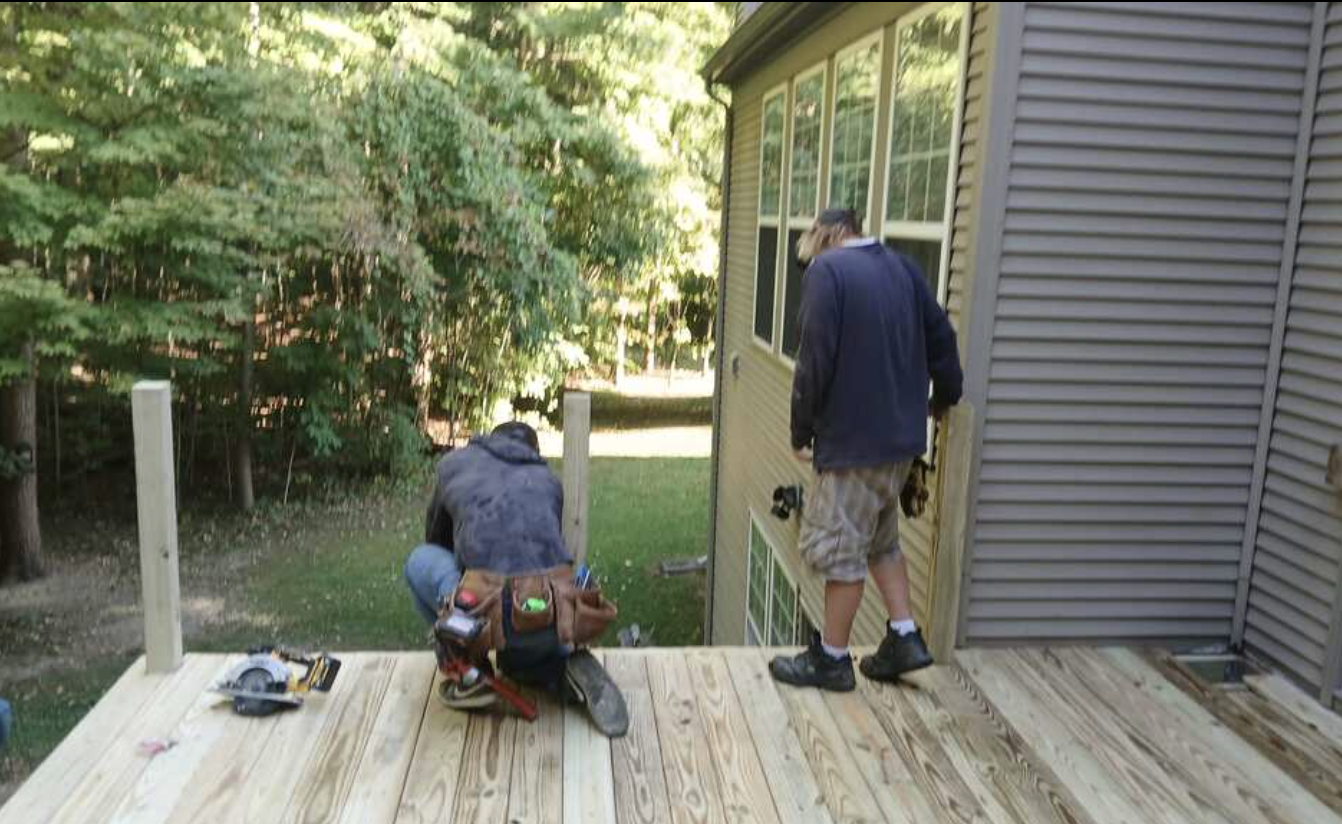 Josh Kiessel and crew building a custom deck in Ann Arbor
